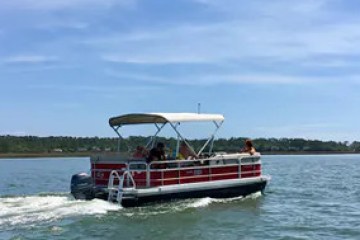 a small boat in a large body of water