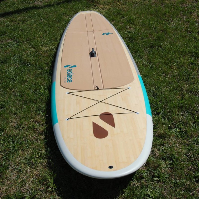 A paddle board in the grass