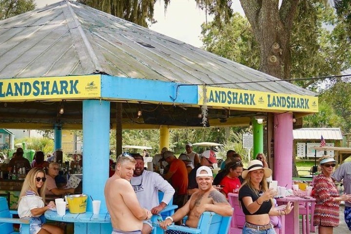 a group of people standing in front of a crowd