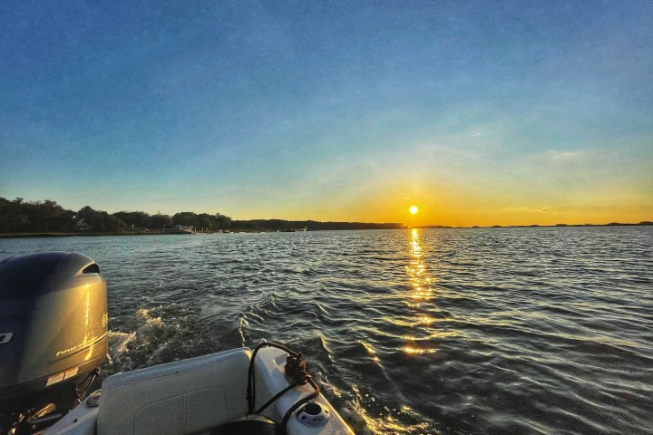 a boat parked next to a body of water