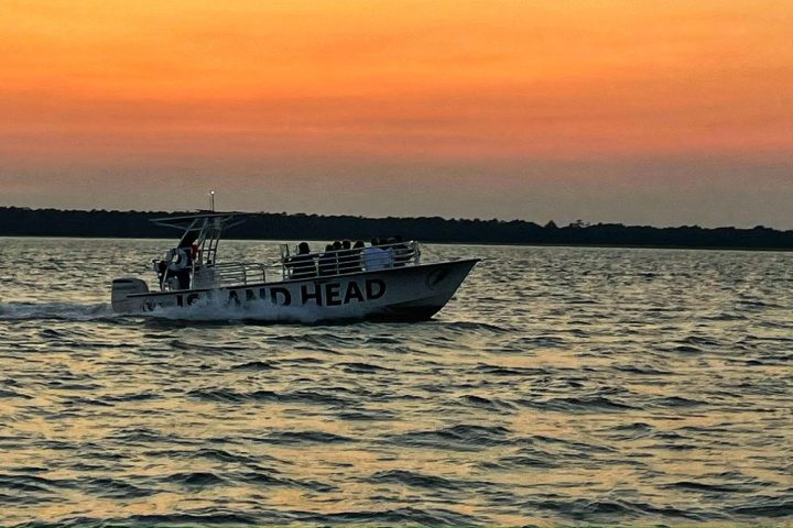 a sunset over a body of water