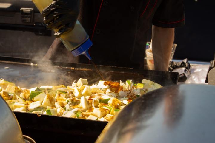 a person preparing food in a kitchen