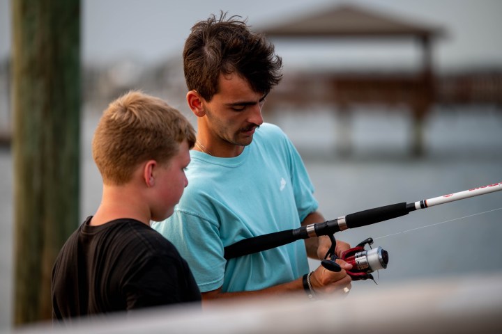 a man in a blue shirt